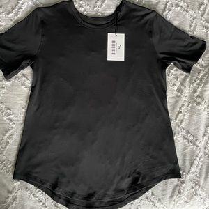 NWT black Zyia active go to T